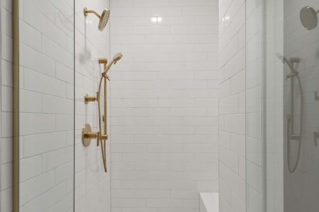 details with an enclosed shower