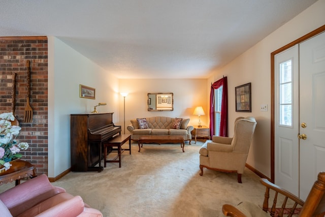 living room with a textured ceiling and light carpet