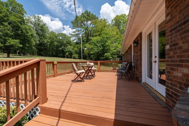 wooden terrace featuring french doors