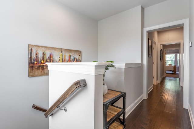 corridor featuring dark hardwood / wood-style floors