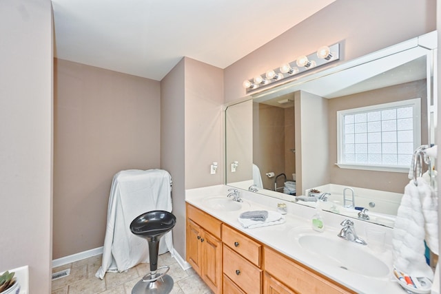 bathroom featuring vanity