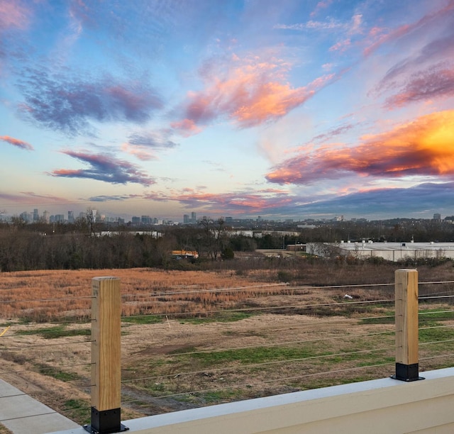 view of yard at dusk