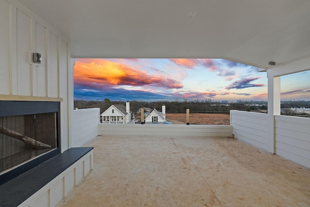 view of patio terrace at dusk