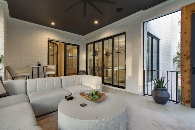 view of patio / terrace featuring ceiling fan and an outdoor living space