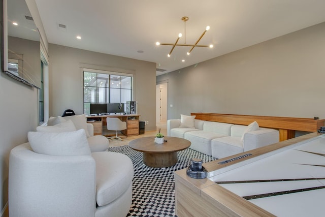 living room with an inviting chandelier