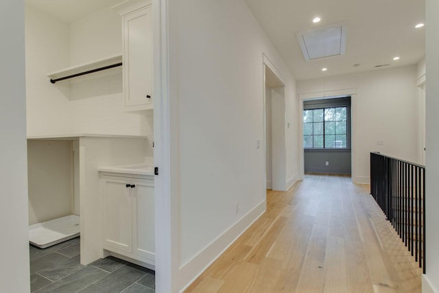 corridor featuring light hardwood / wood-style flooring