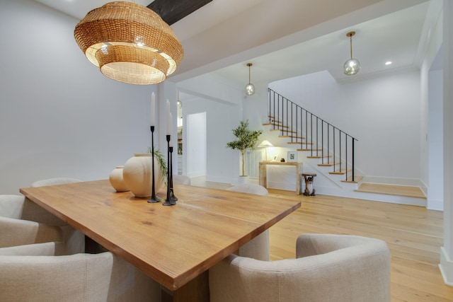 dining area with hardwood / wood-style floors