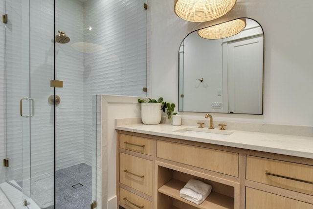 bathroom with vanity and walk in shower