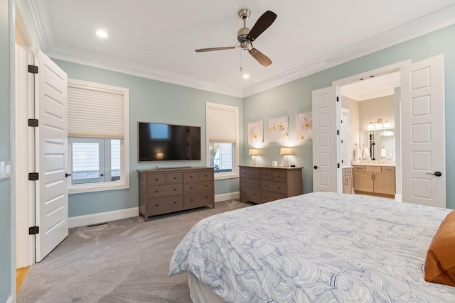 bedroom with ceiling fan, crown molding, ensuite bathroom, and light carpet