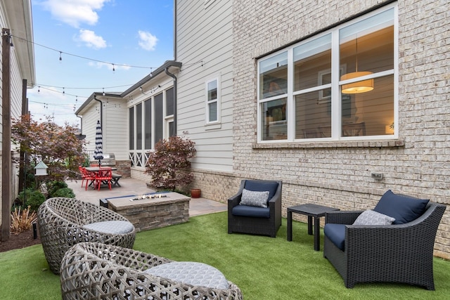 exterior space with an outdoor fire pit