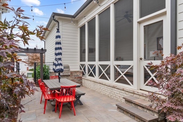 view of patio / terrace featuring grilling area and an outdoor kitchen