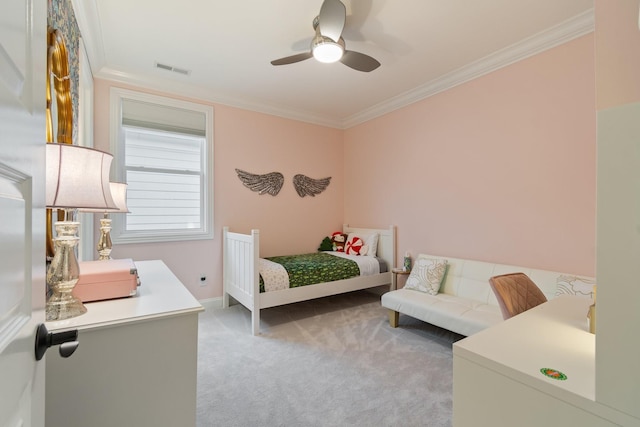 bedroom featuring ceiling fan, light colored carpet, and ornamental molding