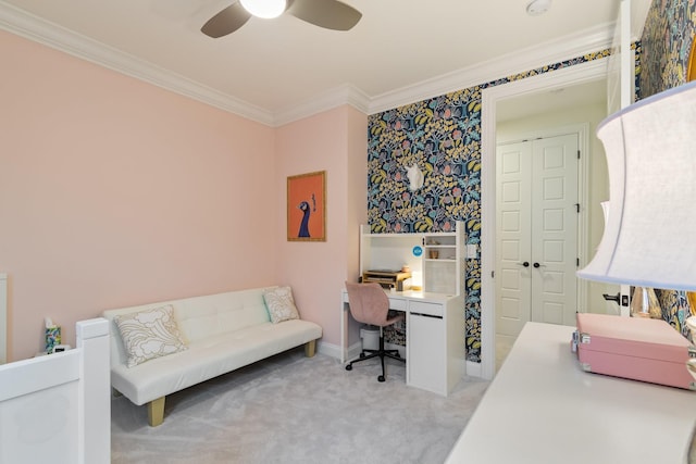 carpeted office with ceiling fan and crown molding