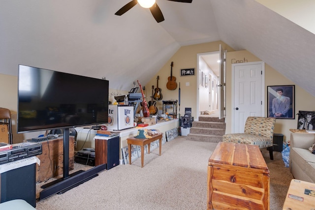 living room with carpet, ceiling fan, and lofted ceiling