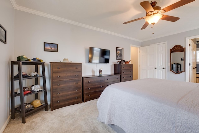 bedroom featuring light carpet, ceiling fan, and ornamental molding