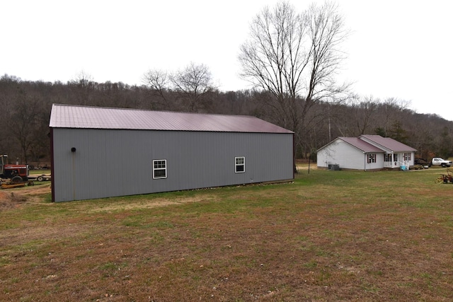 view of home's exterior featuring a lawn