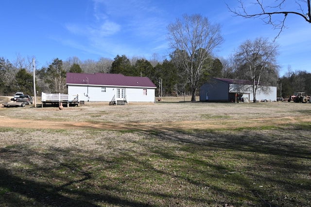 view of yard featuring a deck