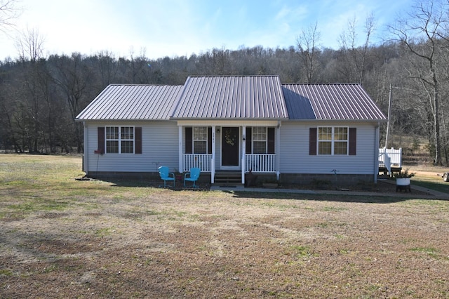 view of front facade with a porch and a front yard