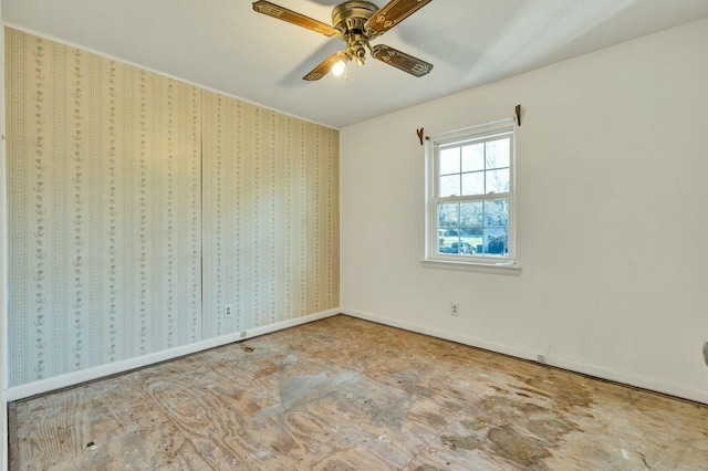 unfurnished bedroom featuring ceiling fan