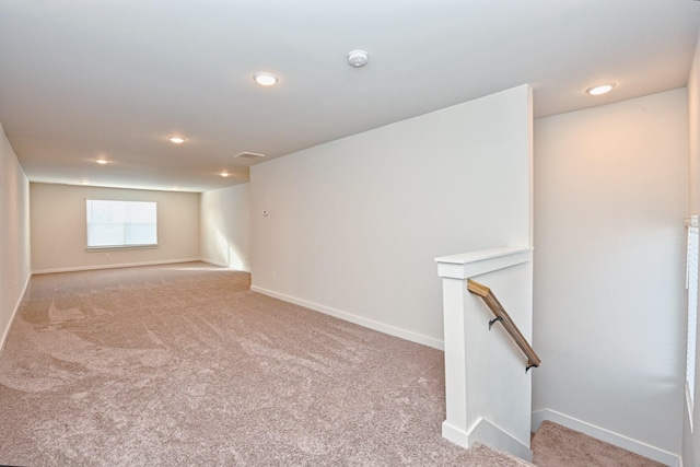 basement with light carpet