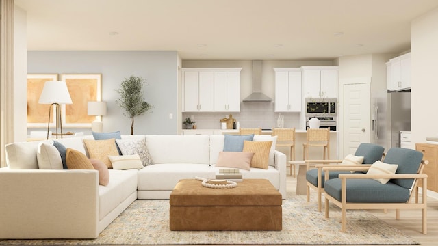 living room with light hardwood / wood-style flooring