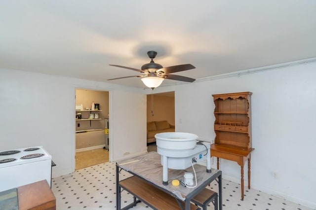 interior space featuring ceiling fan