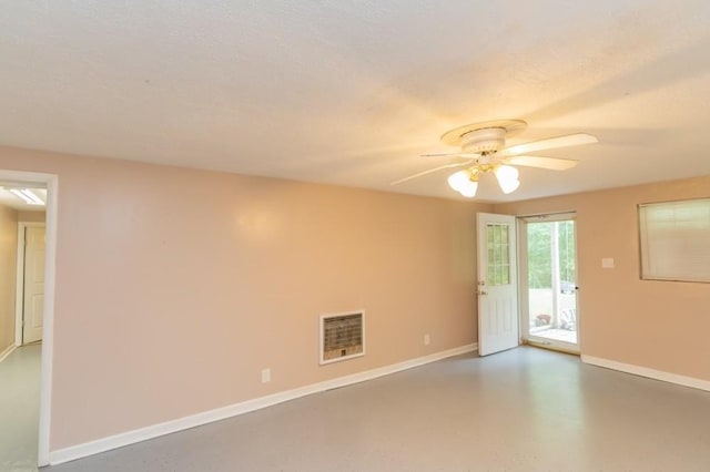 unfurnished room featuring a textured ceiling and ceiling fan