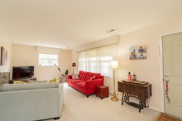 living room featuring carpet floors