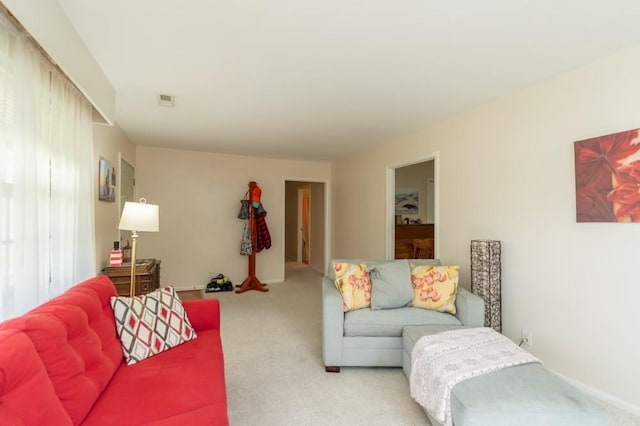 living room with light colored carpet