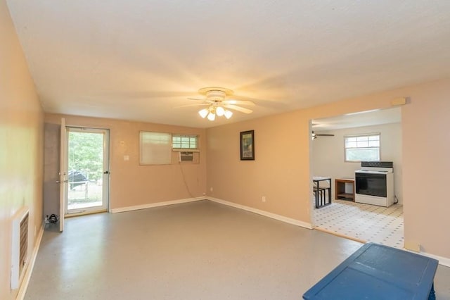 interior space featuring ceiling fan and cooling unit