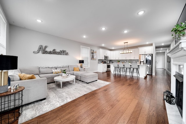 living room with hardwood / wood-style floors