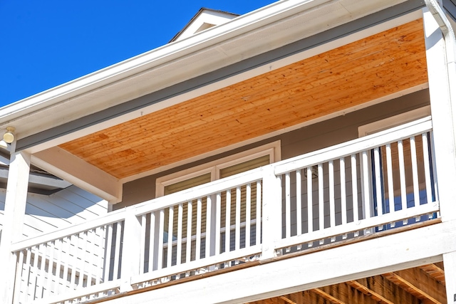 view of side of home with a balcony