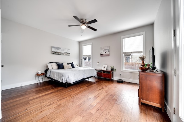 bedroom featuring wood-type flooring and ceiling fan