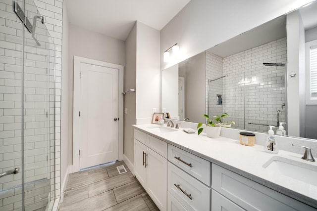 bathroom featuring vanity and walk in shower