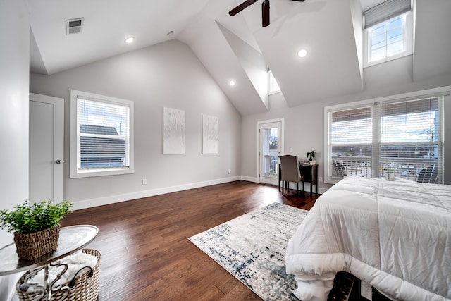 bedroom with dark hardwood / wood-style floors, ceiling fan, high vaulted ceiling, and multiple windows