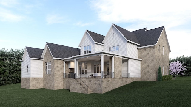 view of front of property featuring a front lawn, ceiling fan, and covered porch