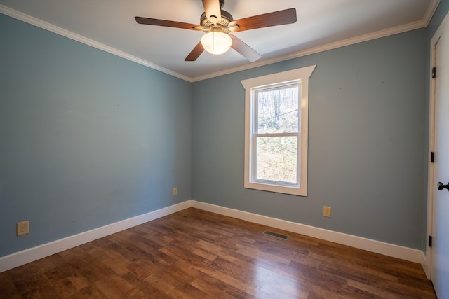 unfurnished room with ceiling fan, ornamental molding, and dark hardwood / wood-style floors