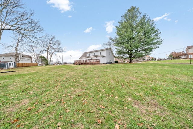 view of yard with a wooden deck