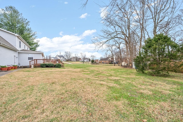 view of yard with a deck