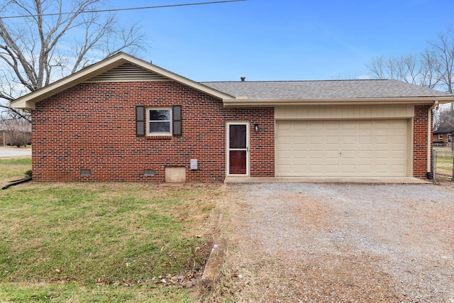 ranch-style house with a front lawn and a garage