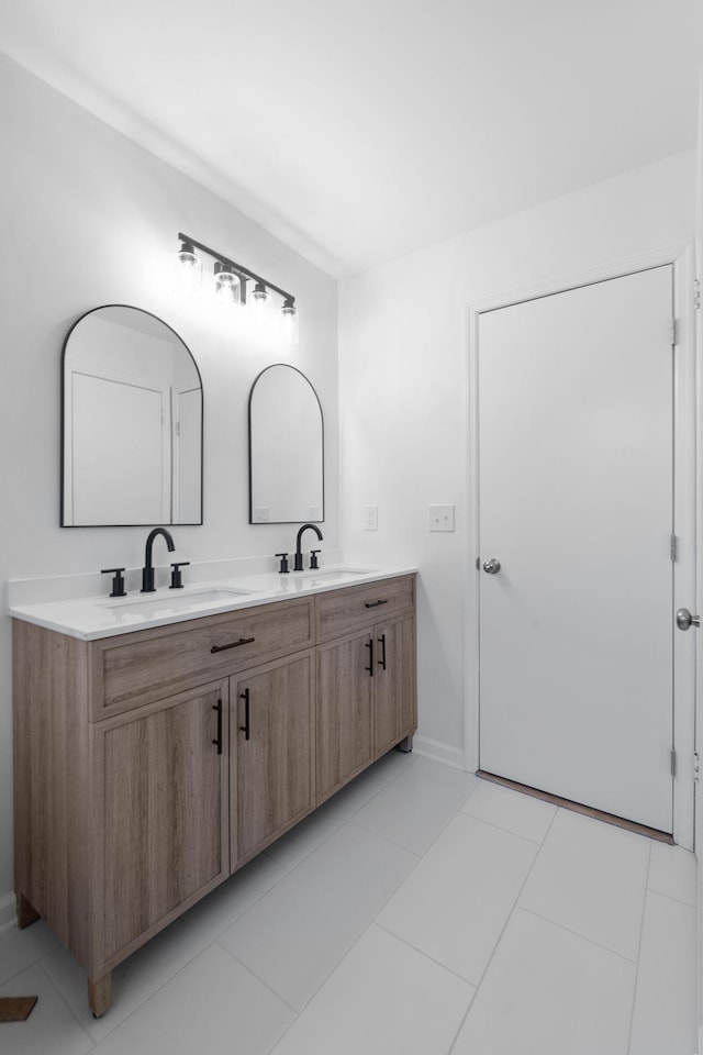 bathroom with vanity and tile patterned floors