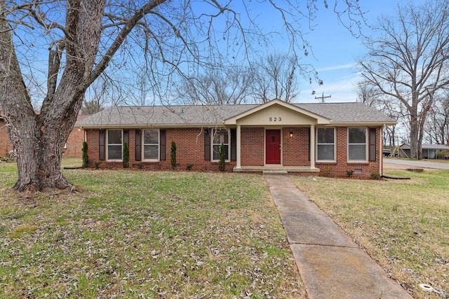 single story home with a front yard