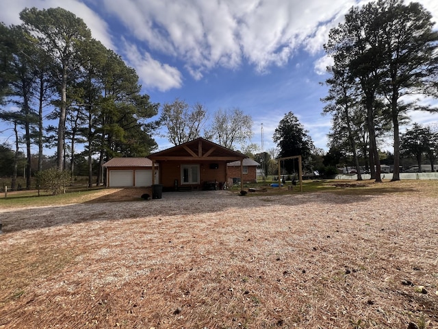 exterior space with a garage