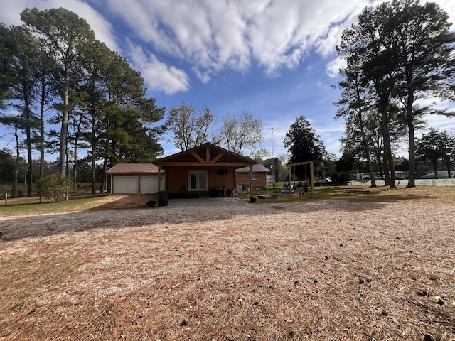 619 N Diagonal St, Decherd, TN 37324 - view of front of house with a garage