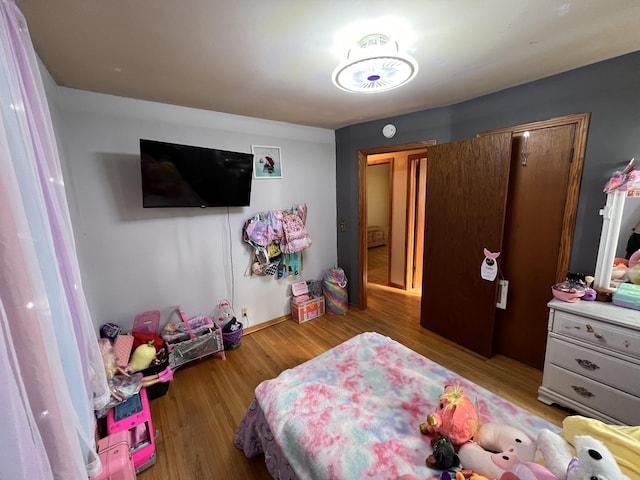 619 N Diagonal St, Decherd, TN 37324 - bedroom with wood finished floors and baseboards
