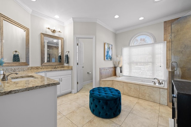 bathroom featuring vanity, crown molding, and tile patterned flooring