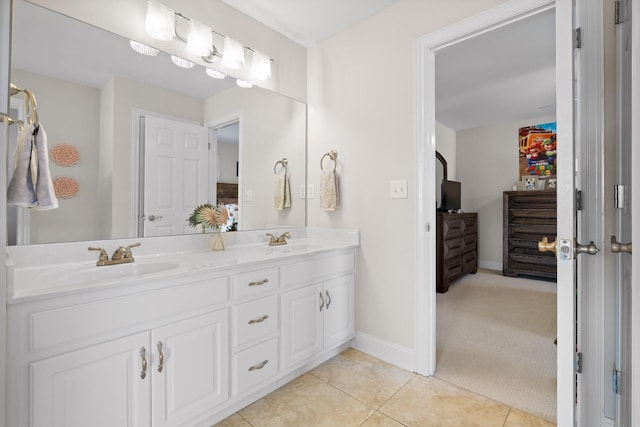 bathroom featuring vanity and tile patterned flooring