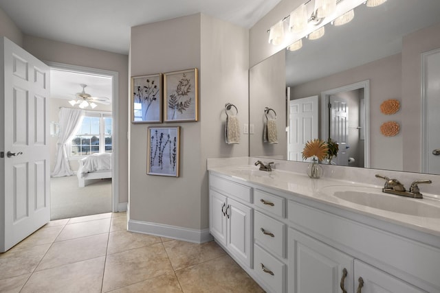 bathroom featuring ceiling fan, vanity, and tile patterned flooring