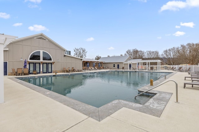 view of pool featuring a patio and a pergola