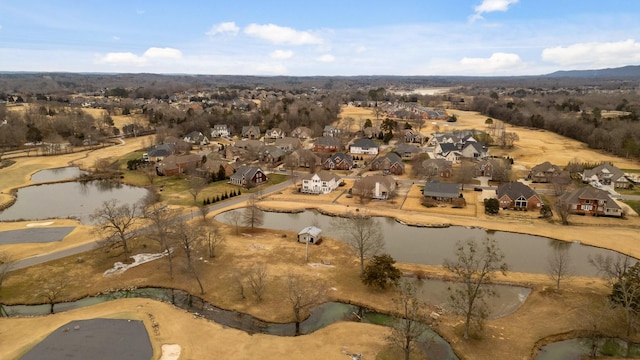 drone / aerial view with a water view